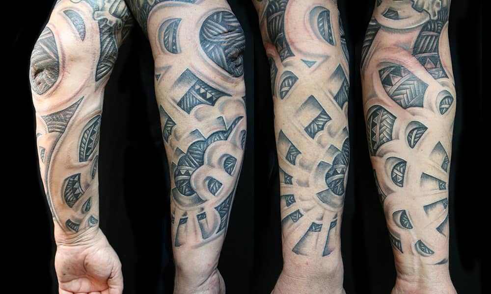 1 year old sleeve. Geometric wolf mixed with Polynesian. Done by Bjorn  Severin at MiksTattoo in Copenhagen, Denmark. The turtle and the circle  around it was done 3 years prior to the