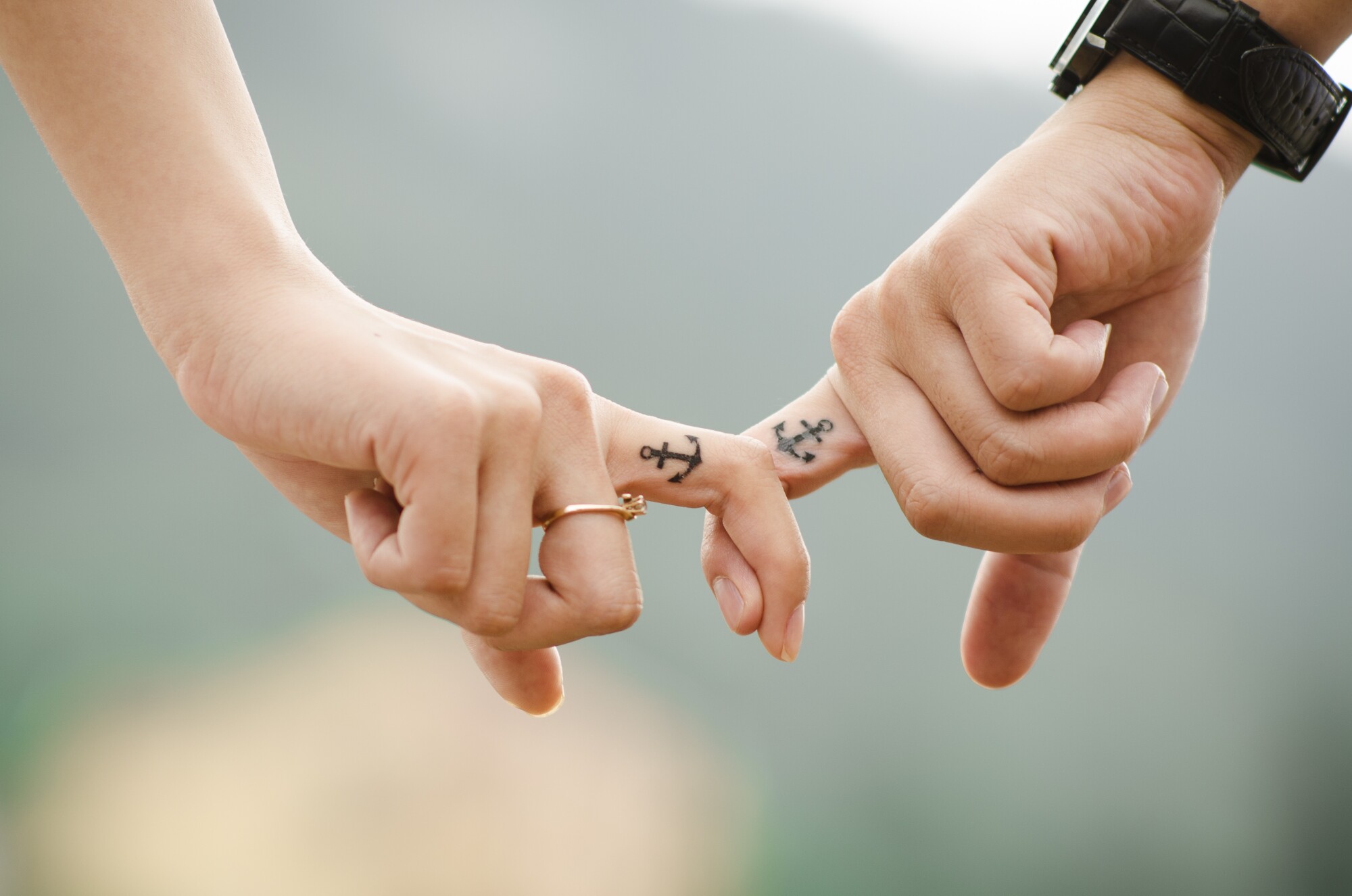 Matching wedding ring tattoos on fingers - Tattoogrid.net